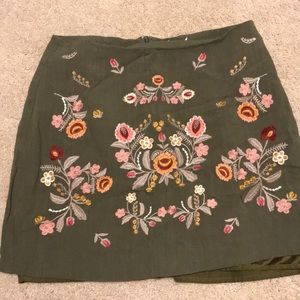 green embroidered skirt